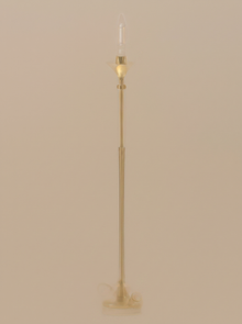 Gold cordless table lamp on a clean studio background
