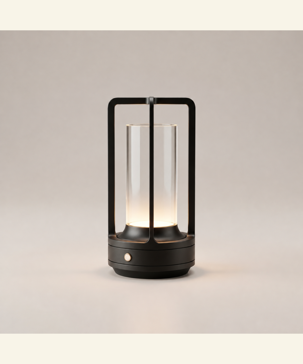 Black metal cordless table lamp on a clean studio background